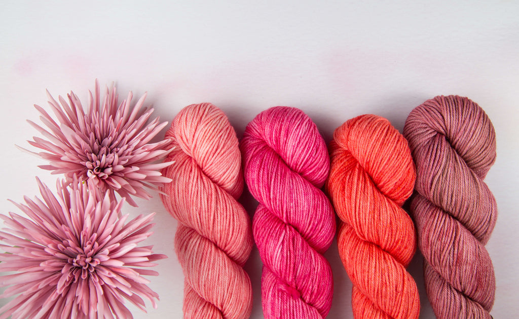 Beautiful skeins of yarn and flowers 